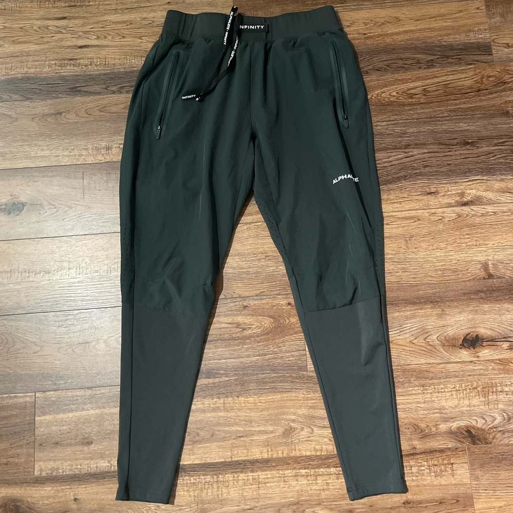 Mens  Alphalete forest green pants size Medium